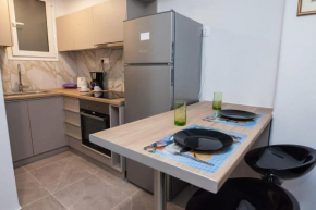Charming Urban Oasis 1BR Apartment Near Megaro Mousikis